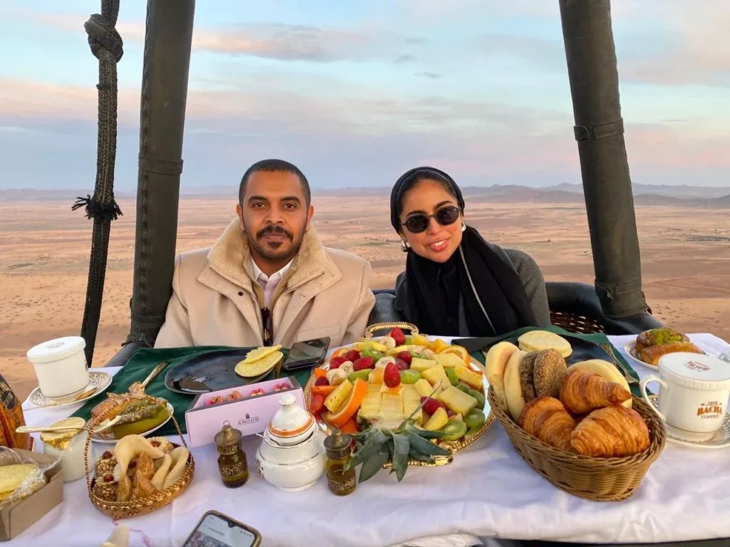 Couple enjoying a private hot air balloon flight above Marrakech